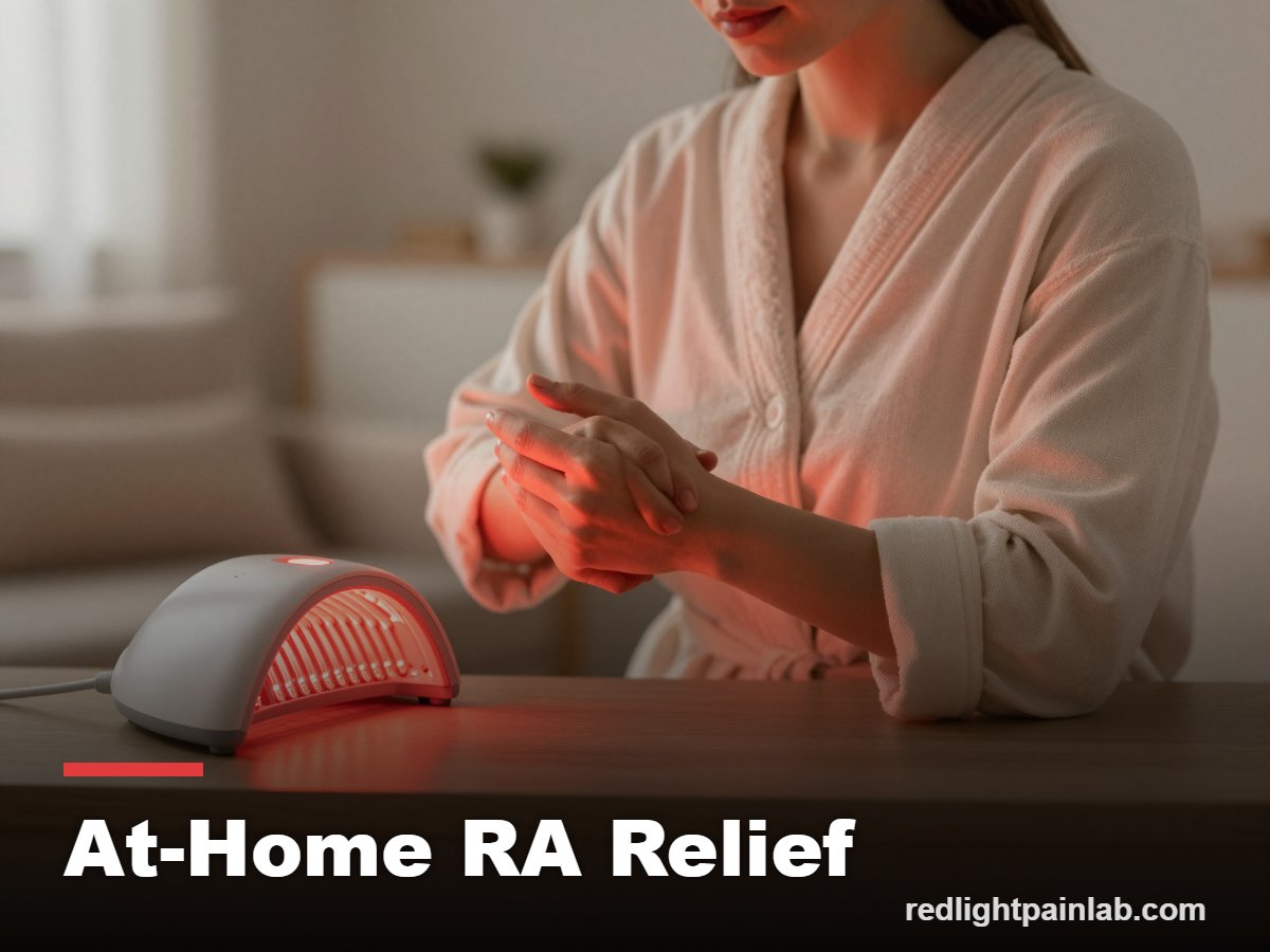 Person easing stiff hands under a red light therapy device at home